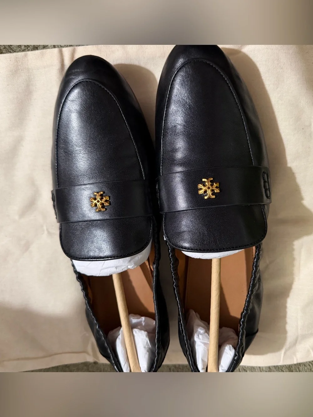 Tory Burch Black Leather Slip-On Loafers with Gold Emblem